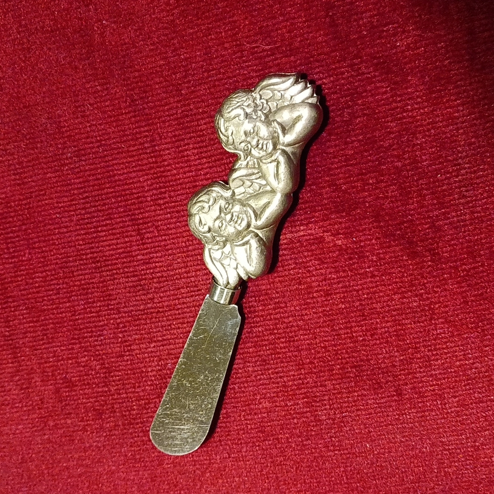 Stainless steel cherubs butter knife
